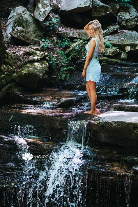 Waterfall senior photos, creative senior photos, modern senior photos, senior model, senior photos in water, senior photo ideas, senior photo inspo Senior Picture Ideas Laying In Water, Senior Pictures By Waterfall, Waterfalls Photoshoot Ideas, Waterfall Pics Ideas, River Photoshoot Models, Senior Picture Ideas Waterfall, Water Senior Picture Ideas, Water Picture Ideas, Waterfall Senior Pictures