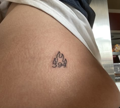 Tattoo simple flame firefighter wife modern Small Fireman Tattoo, Firefighter Number Tattoo, 343 Firefighters Tattoos, Fireman Wife Tattoo, Subtle Firefighter Tattoo, Fire Hat Tattoo, Firefighters Tattoo Ideas, Woman Firefighter Tattoo, Firefighter Hat Tattoo