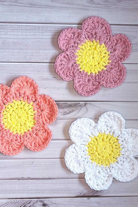 Crochet Flower Coaster Pattern - 6 Petals - thecaffeinatedsnail.com Coaster Set Crochet Free Pattern, Crochet Flower Trivet, Kitchen Scrubby Crochet Pattern, Crochet Flower Coaster Patterns, Crochet Daisy Coasters Free Pattern, Free Pattern Crochet Coasters, 6 Petal Crochet Flower Pattern, Spring Crochet Coasters, Daisy Coaster Crochet Pattern