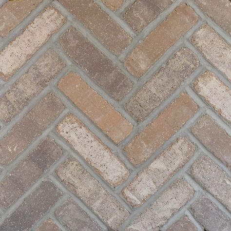 White herringbone tile floor