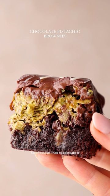 Rosie Brown on Instagram: "Pistachio Chocolate Brownie 🤎 (egg free + dairy free)   Inspired by the viral Dubai Chocolate Bar this brownie is rich and fudgey filled with pistachio butter and crispy toasted pastry pieces. Covered in a thick chocolate ganache drizzled with white chocolate this brownie is the definition of indulgence.  INGREDIENTS Brownie 150g dark chocolate (min 50% cocoa) 140g plain flour 200g caster sugar 50g light brown sugar 120g dairy / dairy free butter 120g dairy / dairy free milk 60g dark cocoa powder Filling 200g pistachio paste / butter 1 tbsp butter 200g filo pastry, shredded Topping 125g dairy free / dairy dark chocolate 100g dairy free / dairy double cream 50g dairy free / dairy white chocolate, melted INSTRUCTIONS Line and lightly grease a 15cm square baking tr Dark Chocolate Pistachio, Dairy Free Butter, Pistachio Paste, Dubai Chocolate, Pistachio Chocolate, Dark Chocolate Recipes, Pistachio Butter, Pistachio Cream, Filo Pastry