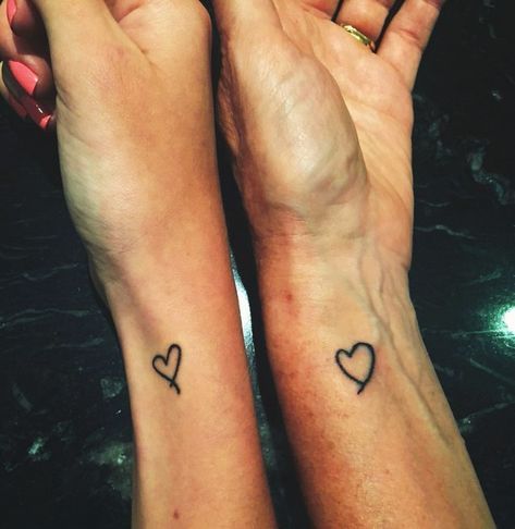 26 Insanely Creative Tattoos To Get With Your Mom Mommy Daughter Tattoos, Maching Tattoos, Mother Son Tattoos, Mom Daughter Tattoos, Baby Name Tattoos, Pawprint Tattoo, M Tattoos, Relationship Tattoos, Drawn Heart