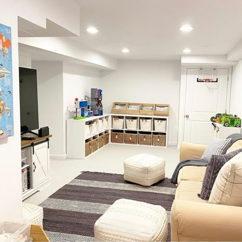 Basement Cube Storage, Playroom And Living Room Combo Basement, Organizing Toys In Basement, Toy Room Basement, Toy Storage Basement, Basement With Play Area, Toys In Living Room Organizing, Small Basement Playroom, Basement Toy Storage