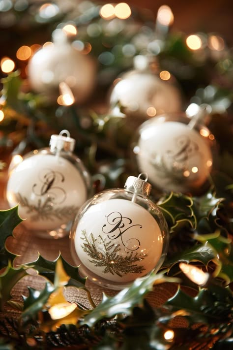 Step into a wedding winter wonderland! 🎄✨ Discover the charm of unique wedding keepsakes with bespoke ornaments featuring the newlyweds' initials. Perfectly nestled amidst evergreen holly and the magical shimmer of fairy lights, these favors are a hit with guests! #WeddingInspiration #WinterWedding #ChristmasWedding #WeddingFavors #CustomFavors #BrideToBe #WeddingDecor #FestiveWedding Christmas Wedding Souvenirs, Winter Wonderland Wedding Favors, Christmas Ornaments Wedding Favors, Winter Wedding Guest Favors, Winter Wedding Favors For Guests, Christmas Ornament Wedding Favors, Wedding Favors Winter, Initial Ornaments, Wedding Winter Wonderland