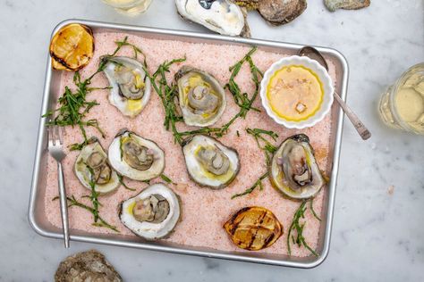 Easy Steamed Oysters on the Grill | Wine Enthusiast Oysters On The Grill, Steamed Oysters, Undercounter Wine Cooler, Shucking Oysters, Oyster Recipes, Champagne Vinegar, Open Fire, On The Grill, Wine Enthusiast