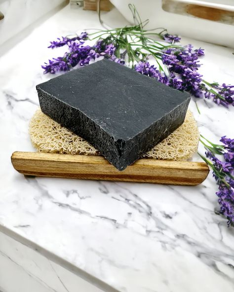 Our Lavender charcoal soap offers several benefits: 🧼 Cleansing: Activated charcoal in the soap helps to draw out impurities and toxins from the skin, providing a deep cleansing effect. 🧼 Exfoliation: Charcoal particles gently exfoliate the skin, removing dead skin cells and leaving it smoother and softer. 🧼 Calming: Lavender scent has a calming effect on the mind and body, helping to reduce stress and promote relaxation during the cleansing process. 🧼 Moisturizing: Some lavender charcoal... Charcoal Bar, Activated Charcoal Soap, Charcoal Soap, Soap Base, Unclog Pores, Skin Benefits, Activated Charcoal, Lavender Scent, Deep Cleansing