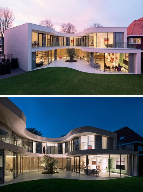 This modern house full of curved glass windows opens up to the backyard and curves around a mature olive tree. Mvrdv Architecture, Dream House Mansions, Design Salon, Casa Exterior, House Viewing, Dream House Exterior, Dream House Plans, Olive Tree, Villa Design