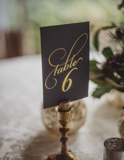 Table number in cork and brass candlestick | Unique wedding table number ideas | Chateau Taillefer-Lafon wedding Candlestick Table Numbers, Tall Table Numbers, Wedding Table Number Ideas, Gold Table Number Holders, Unique Table Numbers Wedding, Table Number Ideas, Vintage Table Numbers, Unique Table Numbers, Gold Table Numbers Wedding