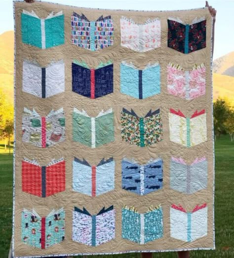 Book lovers who love to quilt will burst at the seams with ideas for their next quilting project with these best bookish quilt patterns and quilt blocks. #BookishQuiltPatterns #BookishQuiltBlocks #LiteraryQuiltBlocks #LiteraryQuiltPatterns #BookQuilts Book Nerd Quilt, Bookcase Quilt Pattern, Book Quilt Pattern, Nerd Quilt, Book Shelf Quilt, Library Quilt, Rug Mugs, Bookcase Quilt, Book Supplies