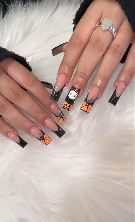 Gothic Hello Kitty Nails, October Classy Nails, Fall/halloween Nails Square, Tapered Square Halloween Nails, October Nail Ideas 2024, Spooky Hello Kitty Nails, Hello Kitty Nails Halloween, Halloween Square Nails, Halloween Simple Nails