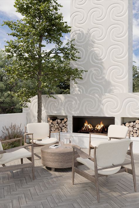 Outdoor fireplace installation with concrete tile facing in geometric swirl design. Outdoor lounge furniture in white and oak wood tones. Pursley Dixon, Spa Tile, Fireplace Outdoor, Ann Sacks Tiles, Ann Sacks, Concrete Fireplace, Outdoor Stone, Live In Style, Outdoor Inspirations