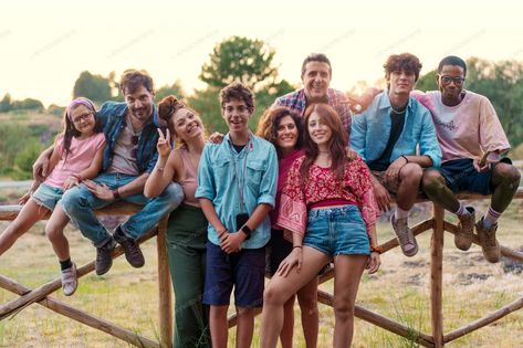 Diverse group of friends enjoying summer outdoors, multicultural family bonding on wooden fence, Photos - Envato Elements Family Bonding, Royalty Free Music, Music Logo, Premiere Pro, Enjoy Summer, Group Of Friends, Wooden Fence, Music Design, Free Music