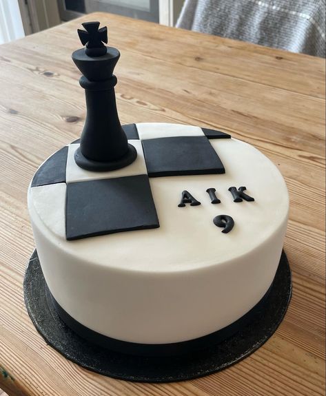 Fondant covered chocolate cake made for a young Ukrainian visitor’s birthday. Chess Cake Topper, Chess Cake Ideas, Chess Birthday Party Ideas, Chess Cake Design, Chess Theme Cake, Chess Birthday Cake, Chess Cakes, Chess Birthday Party, Chess Birthday