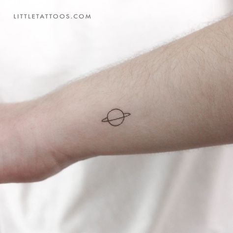 Set of three minimalist Saturn temporary tattoos. Saturn planetary tattoos are enjoying a wave of popularity right now - and for good reason! Visible with the naked eye, this mighty planet has been appreciated and respected by mankind for thousands of years. The ancient Romans believed that Saturn was the god of wealth and agriculture, which were vital concepts in the success of the Roman empire. Today Saturn is associated with hard work, discipline, and responsibility. Capricorns are particular