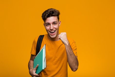 Young student man holding books celebrat... | Free Photo #Freepik #freephoto #book #man #student #science Mother Teresa Art, Book Man, Student Images, Education Poster Design, Student Photo, Computer Help, Happy Students, Green Screen Video Backgrounds, Man Standing