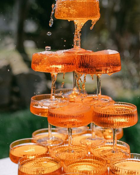 Warm and cozy vibes from a stunning host 🥀 S + B wanted an effortless and romantic ambiance for their night-before Italian welcome dinner @patakranch. Complete with an aperol spritz tower, millefoglie cake, and authentic goodies traveled back from Italy for their guests, the evening was charming in more ways than one. Venue | @patakranch Photo | @hannahquintana Planning + Design | @curatedenver Film | @kellymour__ Floral | @figment_floral Candles | @thetinyhours Specialty Rentals | @eclecti... Aperol Spritz Tower Wedding, Aperol Spritz Tower, Aperol Spritz Italy, Aperol Cake, Millefoglie Cake, Aperol Spritz Party, Hunger Games Wedding, Colorful Bride, Orange Wedding Cake