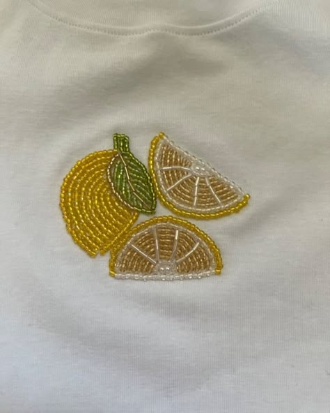 Beaded T-shirts 🤌🏻🫀 Embroidery Patterns For T Shirts, Embroidery Designs In T Shirt, Creative Handmade Things, Lemon Bead Embroidery, Tee Shirt Embroidery, Embroidery Patterns For Shirts, Creative T Shirts, Beaded Shirt Embroidery, Embroider Shirt Ideas