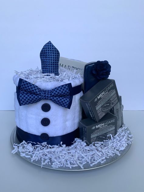 The perfect towel cake for a gentleman or young man! Contains men’s accessories and grooming supplies handsomely placed on a charger. Towel Cake, Towel Cakes, A Gentleman, Diaper Cake, Gentleman, Etsy Seller, Unique Items Products, Gift Ideas, Cake