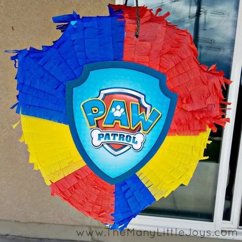 DIY paw patrol party piñata in shape of badge logo. Blue yellow red. Paw Patrol House, Leo Cake, Paw Patrol Pinata, Paw Patrol Badge, Paw Patrol Birthday Decorations, Paw Patrol Party Decorations, Paw Patrol Decorations, Piñata Ideas, Paw Patrol Toys