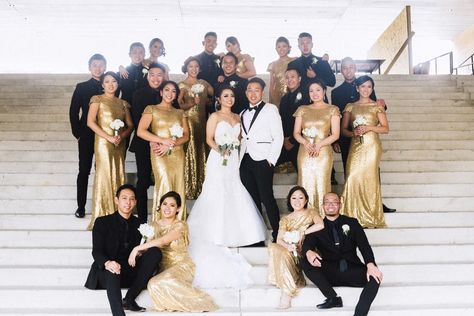 Black White And Gold Groomsmen, Black Tux With Gold Accents, Black And Gold Bridal Party Attire, Black White And Gold Bridesmaid Dresses, Black Gold And White Wedding Theme Bridesmaid Dresses, Black And Gold Wedding Party Attire, White And Gold Wedding Groomsmen, White And Gold Groomsmen Suits, Black White And Gold Wedding Party