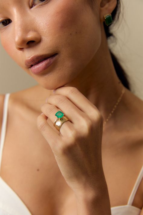 This exquisite Colombian emerald twig ring is a subtle show stopper. The gorgeous green color of the stone is truly one of a kind. This ring pairs beautifully with JP CUSHION CUT COLOMBIAN EMERALD NECKLACE layered with the JP CABLE CHAIN NECKLACE as a set or complements perfectly when stacked with JP GOLD BANDS. The EMERALD is thought of as a symbol of intuition, truth, and abundant love. It is thought to open hearts to give and receive love in all aspects of life… never forgetting self-love. If Green Emerald Ring Engagement, Emerald Stone Engagement Ring, Emerald Ring Design, Emerald And Diamond Engagement Ring, Triangle Diamond Ring, Green Engagement Rings, Emerald Stone Rings, Colombian Emerald Ring, Champagne Diamond Rings