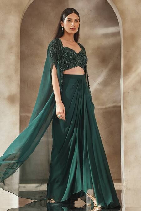 Buy Emerald Green Blouse And Skirt Georgette Embroidery Zari Cape Open Set For Women by Seema Thukral Online at Aza Fashions. Indian Outfits Modern, डिजाइनर कपड़े, Emerald Green Blouse, Mehendi Outfit, Function Dresses, Mehendi Outfits, Lehenga Designs Simple, Draping Fashion, Traditional Indian Dress