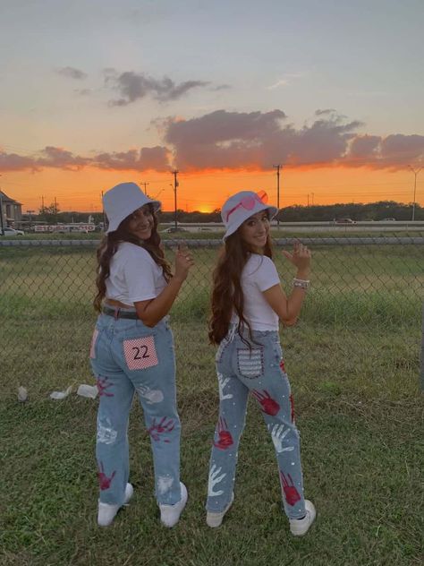 15 Cutest Senior Jeans Ideas We're Obsessing Over Right Now Senior Overalls Purple And Gold, Bad Bunny Senior Jeans, Overall Hoco Ideas, Senior Jeans Painted 2023 Back, Senior Pants 2023, Homecoming School Spirit Outfits, Cute Painted Jeans School Spirit, Class Of 2023 Jeans, Spirit Jeans Homecoming Senior