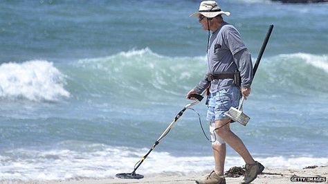 Man on beach with metal detector Metal Detecting Tips, Metal Targets, Gold Detector, Dry Sand, Saving A Marriage, Metal Detecting, Gold Nugget, Men Beach, Metal Detector