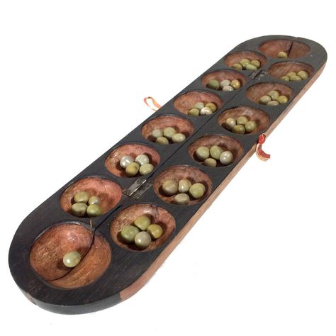 Mancala – Learn Math With Games Ceramic Mancala Game, Oware Game, Games For Two People, Mancala Board, Mancala Game, Children In Africa, Elephant Carving, Learn Math, Shop Front Signage