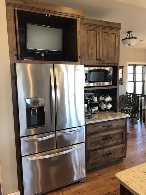 TV in cabinet above refrigerator Kitchen Ideas With Fridge, Tv In Kitchen Cabinet, Refrigerator Kitchen Design, Kitchen Ideas Fridge, Tv In Cabinet, Above Refrigerator Ideas, Over Fridge Storage, Above Fridge Ideas, Cabinet Above Refrigerator