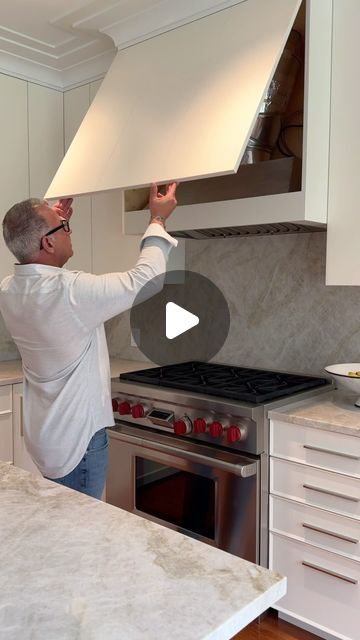 Newton Kitchens & Design on Instagram: "A unique solution to easily access your range hood! We’ve designed so many beautiful custom hoods over the years but accessing the mechanics for maintenance has always been a challenge. Do you think you would have noticed this hidden lift?⁣
⁣
#hiddenstorage #hiddenspaces #interiordesign #craftsmanship #customcabinets #cabinetry #kitchencabinets #kitchendesign #kitcheninspo #kitchenhack #rangehood" Hidden Hood In Kitchen, Kitchen Range Hood Cover, Forrest Frank, Kitchen Hood Ideas, Connor Price, Kitchen Hood Design, Kitchen Vent Hood, Apartment Remodel, White Oak Kitchen