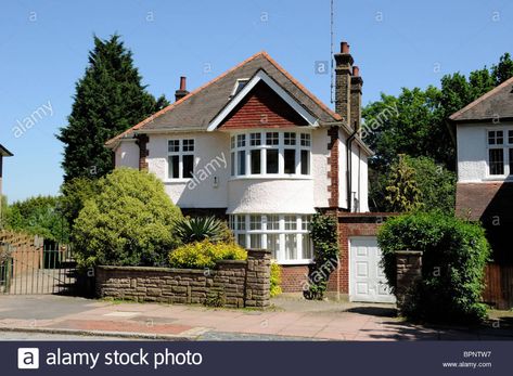 1930's Detached House with garage London England UK Stock Photo 1930s House Exterior Uk, 1930s House Exterior, Bay Window Exterior, House With Garage, 1930s House Interior, Window Shadow, England Homes, 1930s House, Garage House