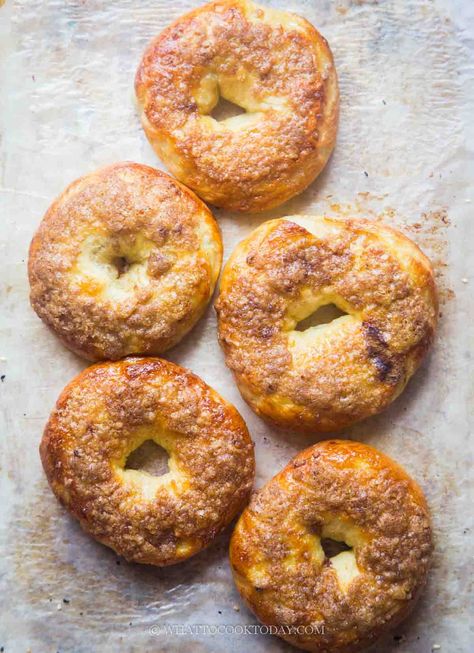 It's the perfect combination of a warm, chewy bagel interior with a crisp, sugary crust. Let’s dive into what makes this bagel so irresistible and why it’s quickly becoming a breakfast staple. Cinnamon Crunch Bagel, Cinnamon Bagels, Cinnamon Crunch, Cookies Pastry, No Knead Bread, Bread Bun, Steamed Buns, Dessert Ingredients, Bread Cake