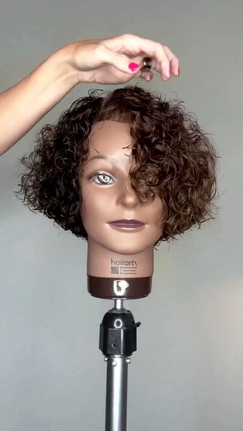 Curly bob haircut tutorial | Curly bangs rule! 🤘 Love this bob haircut from @paulmitchellpro educator, @carrielovesedu 🙌😍 • Curli Bobbi ➰ . @hairartproducts . | By Hairbrained | Facebook Bob Haircut Curly, Curly Bangs, Wispy Bangs, Curly Bob, Bobs Haircuts, Bangs, Hair Color, Hair Cuts, Hair Styles