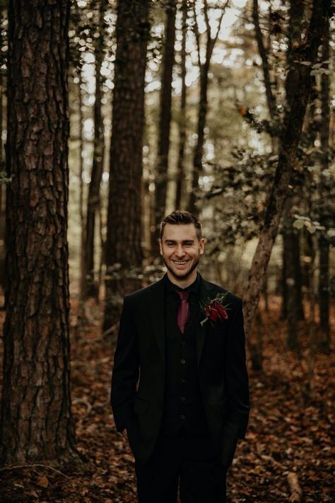 Black And Burgundy Mens Suit, Black Tux Burgundy Tie, Groomsmen Black Suit Burgundy Tie, Goth Groomsmen Attire, Groom Suit Red And Black, Burgundy And Black Groom, Black And Red Wedding Suit For Groom, All Black Suit Burgundy Tie, Black And Maroon Tuxedo Wedding