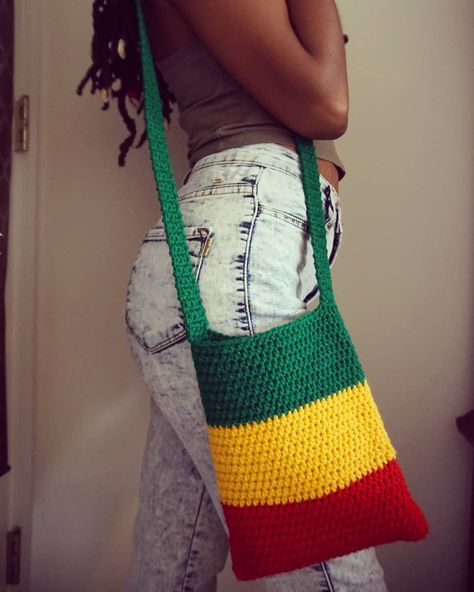 Latia Melody on Instagram: “Rasta crochet bag...can be worn as cross body too...#crochet #rasta #culture #artist #handmade #yarn” Juneteenth Crochet Ideas, Bob Marley Colors, Rasta Crochet Outfit, Rasta Crochet Blanket, Crochet Rasta Hat Pattern Free, Rasta Hats Crochet, Rasta Crochet, Rasta Culture, Crochet Sling Bag