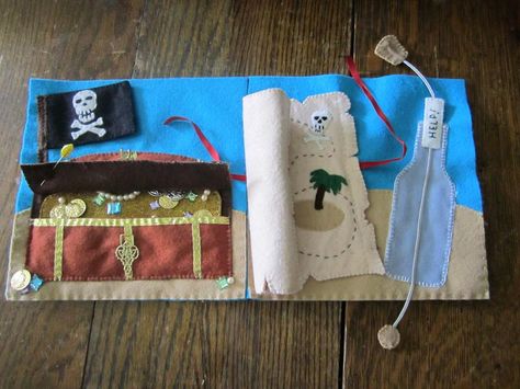 The pirate page for Jared's quiet book.  The note goes in and out off the bottle by pulling the string. The map is rolled up & tied with a ribbon to practice tying knots/bows. The treasure chest has a hook to undo & treasure to take out then put back in (attached with a string so it won't get lost). The flag is only attached at one side so it can wave.  Pattern from www.imagineourlife.com  From Fbk group Diy Kid Toys, Busy Book Ideas, Felt Play Mat, Child Behavior Chart, Tying Knots, Quiet Play, Quiet Book Pages, Diy Quiet Books, Quiet Book Patterns