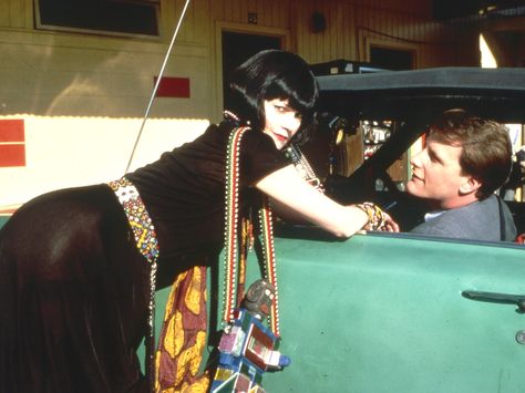 "Something Wild" movie still, 1986.  L to R: Melanie Griffith, Jeff Daniels.  A free-spirited woman (Griffith) "kidnaps" a yuppie (Daniels) for a weekend of adventure. But the fun quickly takes a dangerous turn when her ex-convict husband (Ray Liotta) shows up. Romcoms To Watch, Jeff Daniels, Best New Movies, Wild Movie, Netflix Original Movies, Something Wild, Melanie Griffith, Free Spirited Woman, Best Movies