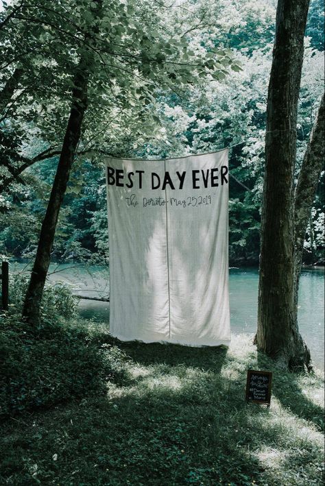 Photo spot banner at our riverside wedding. Painted by a friend on a drop cloth #bohowedding #bohoweddingideas #weddingdecor #weddingdetails Wedding Banner Diy, Intimate Concert, Wedding Pennant, Wedding Flags, Riverside Wedding, Riverside Weddings, Cloth Banners, Cabin Wedding, Yosemite Wedding