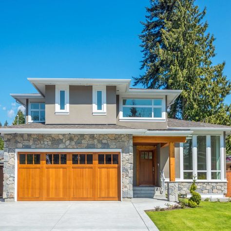 14 Weekend Projects that Add to Home Value | The Family Handyman Bold Front Door, Fiberglass Entry Doors, Add Value To Your Home, Wood Garage Doors, Wooden Garage, Brick And Wood, Roof Colors, Craftsman Bungalows, Home Renovations