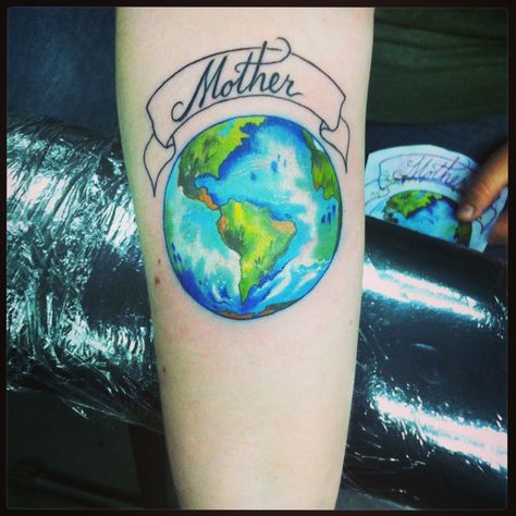 Earth tattoo lol I like this Mini Earth Tattoo, Floral Earth Tattoo, Earth Tattoo Color, Earth Real Tattoo, Realistic Earth Tattoo, Planet Earth Tattoo, Earth Tattoo Ideas, Paper Airplane Tattoos, Circular Tattoo