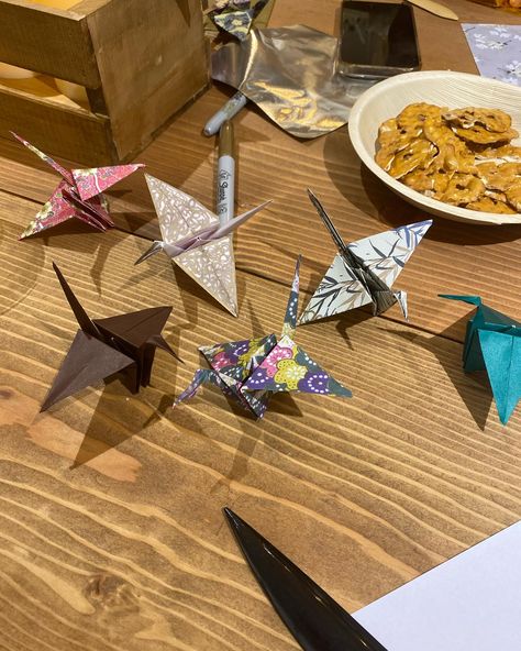 It is said that the crane lives 1,000 years so if you fold 1,000 paper cranes, you will be granted one wish. Cranes are also a sign of fidelity and good fortune. ✨ Spent Friday night at @shopveradoyle ‘s Mindfulness and Origami Crane making workshop. I didn’t know how to do any origami prior to the workshop and am so proud of myself for learning a new skill. I’ve been making them all weekend and now I don’t need the instructions 🤣🫶🏽 Lori, you are the most amazing host. Thank you for invitin... Learning A New Skill, Paper Cranes, Proud Of Myself, Origami Crane, One Wish, Learn A New Skill, Paper Crane, Proud Of Me, Good Fortune