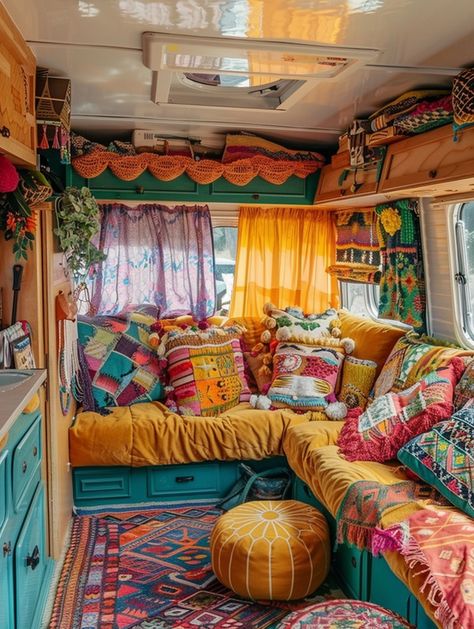 Take your van life to the next level with these luxurious boho camper interior ideas that embody glamping. From intricate drapes to plush cushions, these interiors offer comfort and style, making every getaway feel like a retreat into nature's lap. Bohemian Van Interior, Travel Trailer Living Ideas, Boho Caravan Ideas, Cosy Campervan Interior, Colorful Camper Remodel, Camper Inside Ideas, Bohemian Camper Decor, Retro Camper Decor, Maximalist Camper