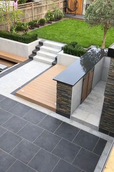 A luxury but low maintenance garden, featuring Marshalls Symphony patio and garden steps in Blue and Granite Eclipse in Light. Back Garden Landscaping, Back Garden Design, Garden Paving, Sloped Garden, Garden Steps, Patio Garden Design, Modern Garden Design, Luxury Garden, Low Maintenance Garden