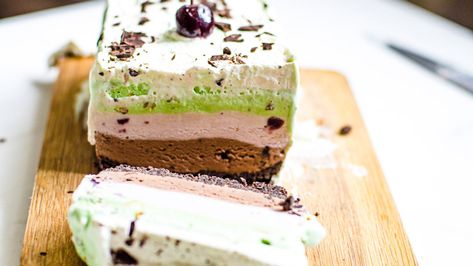 This DIY ice cream cake combines the traditional Italian spumoni flavors of chocolate, cherry, and pistachio ice creams in a delightful frozen treat. Spumoni Ice Cream Cake Recipe, Spumoni Dessert, Spumoni Ice Cream, Diy Ice Cream Cake, Cream Cake Recipe, Italian Ice Cream, Cherry Ice Cream, Ice Cream Cake Recipe, Chocolate Waffles