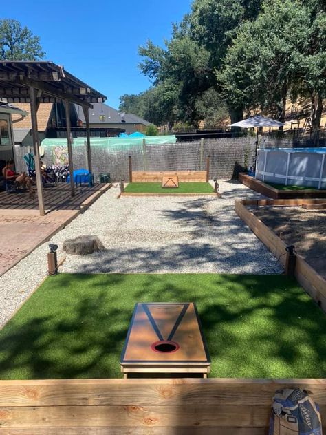 Outdoor Corn Hole Area, Outdoor Cornhole Ideas, Outdoor Cornhole Court, Cornhole Playing Area, Backyard Corn Hole Area, Cornhole Court Backyard Ideas, Backyard Building Ideas, Family Fun Backyard Ideas, Corn Hole Area In Backyard