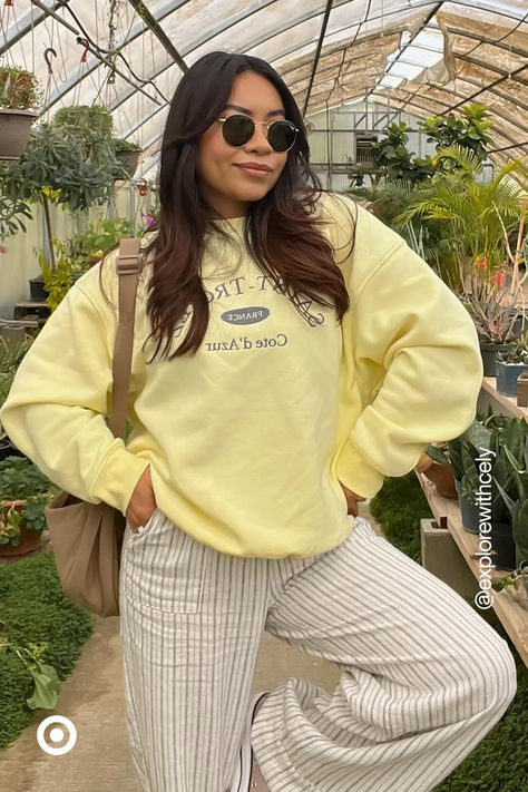 Level up your pastel aesthetic with this buttery yellow sweatshirt. The baggy fit makes it a spring wardrobe staple—style it with lounge pants or a cute tennis skirt for an elevated-casual look. Light Yellow Sweatshirt, Outfit Jamet, Cute Comfy Pants, Comfy Oversized Outfits, Yellow Outfits Aesthetic, Yellow Sweatshirt Outfit, Summer Girl Outfits, Super Casual Outfits, Cute Tennis Skirt