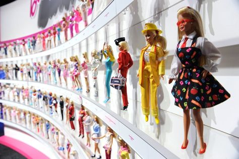 Time Magazine - 13 Most Influential Toys - Oct 2014 - 2. Barbie - Mattel claims a Barbie doll is sold every 3 seconds, which would make the billion-dollar brand the world’s most popular doll w/ > 150 careers i.e.  doctor, scientist & lawyer—since her debut in 1959. “Barbie was the 1st adult version doll that asked girls, ‘What do I want to be when I grow up?’ besides a mom,” says Walsh. Barbie’s 1st African-American friend debuted in 1968, & the 1st African-American "Barbie" debuted in 1980. Barbie Poses, Doll Museum, Barbie Room, Barbie Halloween, Kathy Ireland, Doll Display, Sports Illustrated Swimsuit, Sport Chic