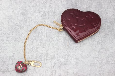 Louis Vuitton Stephen Sprouse Limited Edition Heart Coin purse in Rouge Fauviste. Monogram vernis, golden hardware and resin leopard print heart charm. Zip closure. Leather lining. This heart coin purse is in new condition. Heart Coin Purse, Stephen Sprouse, Heart Coin, Money Moves, Louis Vuitton Accessories, Heart Charm, Leopard Print, Coin Purse, Coin