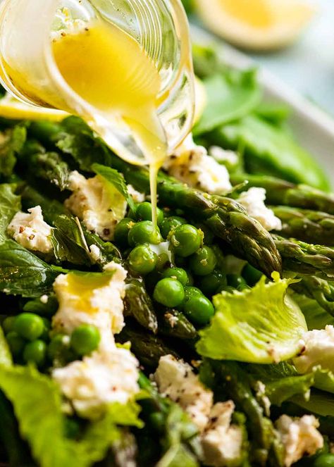 Drizzling lemon dressing over Spring Salad - with asparagus, peas, snow peas, baby cos lettuce (romaine) and goats cheese Lettuce Romaine, Snow Peas Recipe, Elegant Salad, Different Salads, Marinated Vegetables, Recipetin Eats, Goats Cheese, Asparagus Salad, Pea Salad